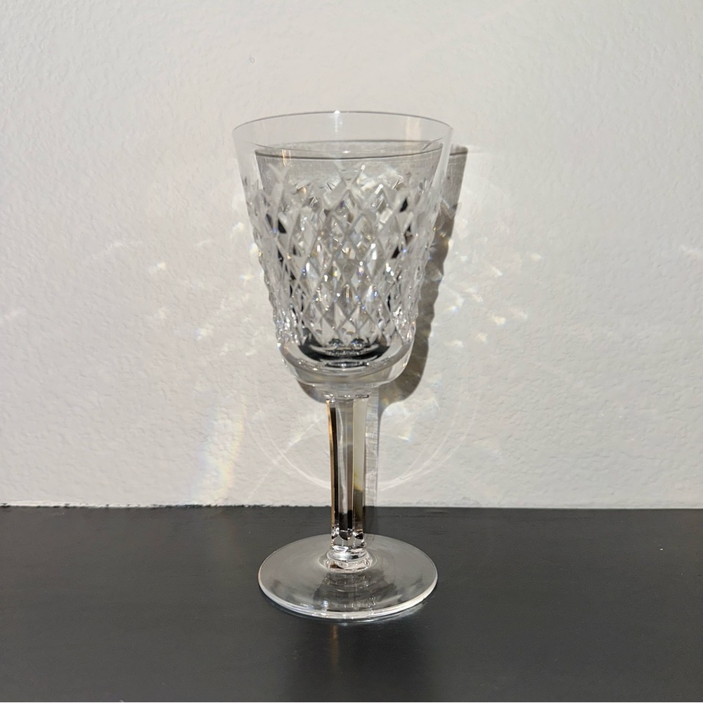 Waterford Crystal Wine Glass 5.5” tall; one glass only.